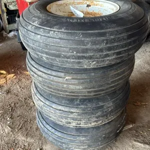 Set of 4 - 9.5L-15SL Tires on Rims