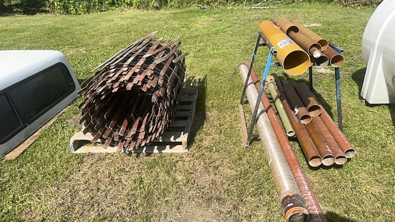 Fiberglass Pipe & Roll of Wood Snow Fence