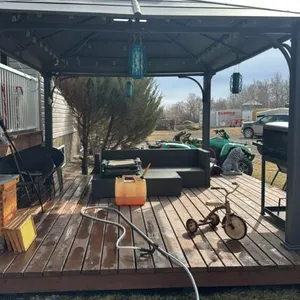 10’x12’ metal gazebo and 14’x16’ treated deck contents not included