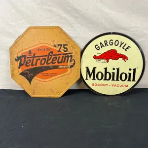 Two Metal Oil Signs