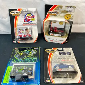 4 Assorted Die Cast Cars