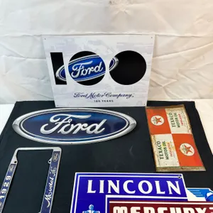 Various Tin Signs and License Plate Cover