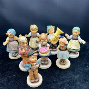 8 Hummel Club Figures