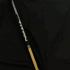 C. Mactavish Titan Hockey Stick