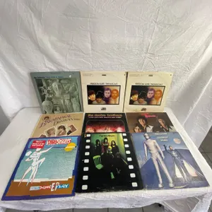 9 LP's featuring Ringo Starr, RaspBerries, Rascals, Dire Straits, Doobie Brothers