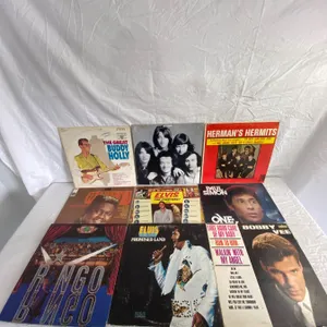 9 LP's featuring Buddy Holly, Ringo Starr, Elvis, Paul Simon