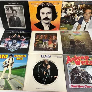 9 Lp's Featuring Elvis, The Steve Miller Band, Chuck Berry
