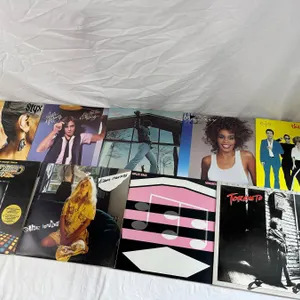 9 LP's featuring Kim Carnes, Split Enz, Billy Joel, B52's