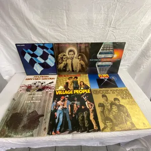 9 LP's featuring Pete Townshend, Village People, Elvis, Hollies, The Cars