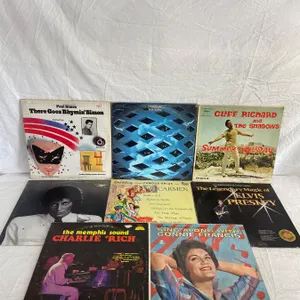 8 LP's featuring Paul Simon, The Who, Elvis, Charlie Rich