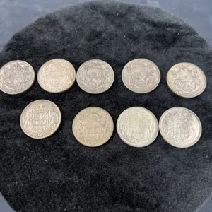 9 Canadian .50 Cent Pieces