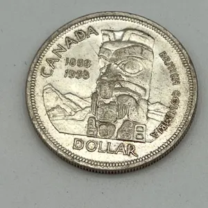 1958 Laureate portrait BC Canada Silver Dollar
