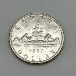 1957 One waterline Variety Canada silver dollar