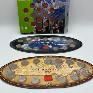 3- Royal Canadian mint quarter sets inc. Nestle