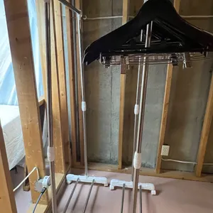 2 Clothing Racks with Wooden Hangers