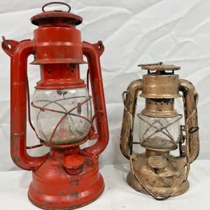 2 Vintage Lanterns. Brands include Jupiter