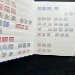 Binder of Assorted American Stamps