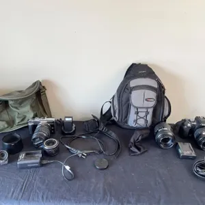 Digital Olympus Cameras with bags