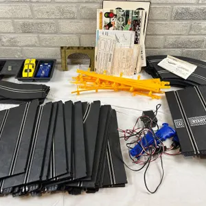 Assorted Race Car Tracks With 3 Cars