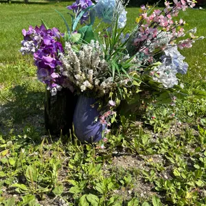 4 planters with artificial flowers