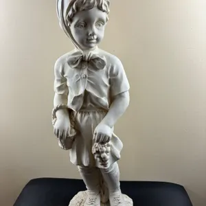 Plaster garden statue