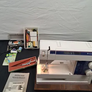 Husqvarna Sewing Machine Model # 230 & Accessories