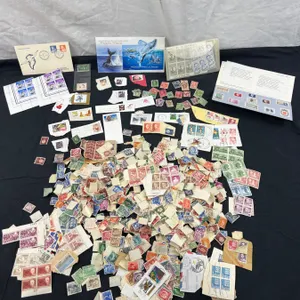 Large Assortment of International Stamps