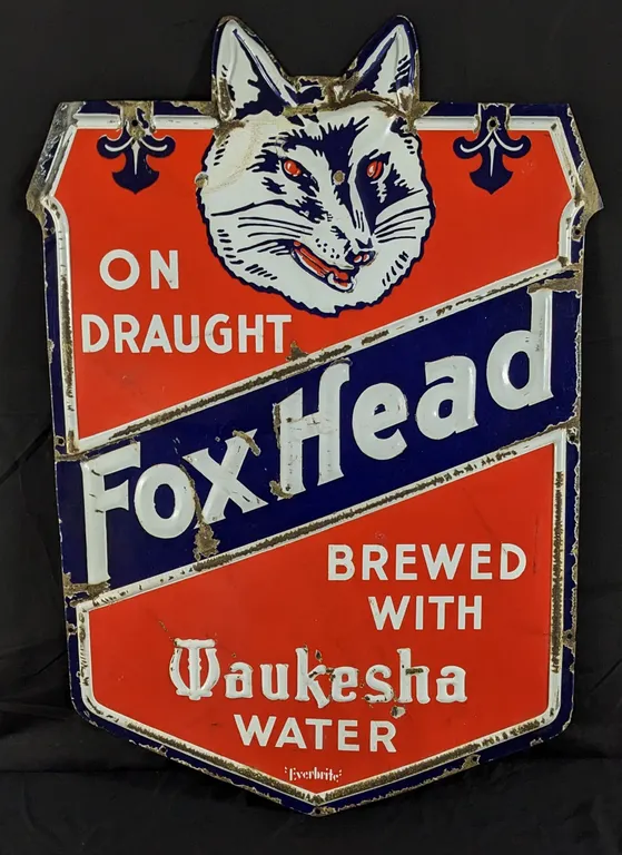 EMBOSSED PORCELAIN BEER SIGN ON DRAUGHT FOX HEAD BREWED WITH WAUKESHA WATER (WISCONSIN)