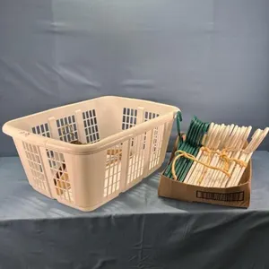 LAUNDRY BASKET WITH APPROX. 24 HANGERS