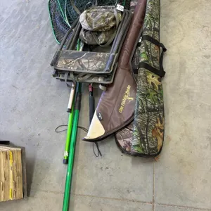 Fishing nets, gun cases, chair