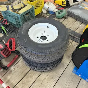 2- tires w/rims 20.5x8.0-10