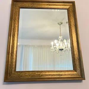 Wall Mirror with a Metallic Gold Frame