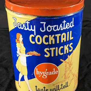 TIN LITHO CAN TASTY TOASTED COCKTAIL STICKS HYGRADE BAKERY CO PHILADELPHIA PENNSYLVANIA