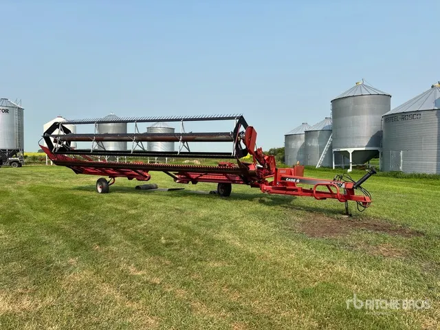 1999 Case IH 8220 25 ft Pull Type Swather Windrower