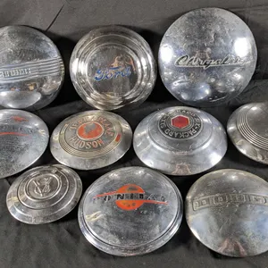 COLLECTION OF 10 VINTAGE AUTOMOBILE HUB CAPS FORD BUICK CHEVROLET PONTIAC HUDSON CHRYSLER DODGE ETC