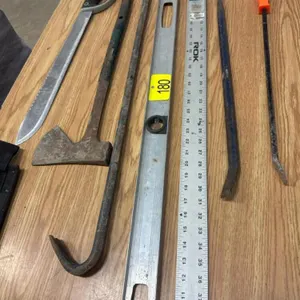 Straight edge, level, pry bars saw hatchet