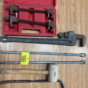 Pipe wrench, breaking bars, coil spring tool