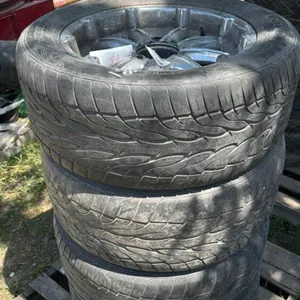 (4) TOYO TIRES ON 8 BOLT RIMS