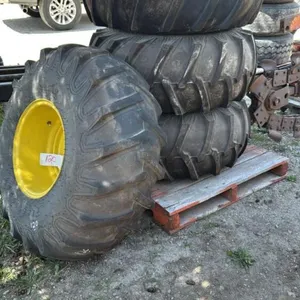 (4) FIRESTONE 16.5L-16.1 TIRES ON 8 BOLT RIMS