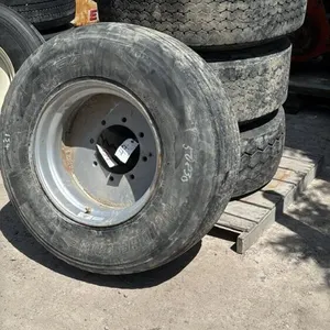 (4) UNMATCHED 385/65R22.5 TIRES ON 8 BOLT RIMS