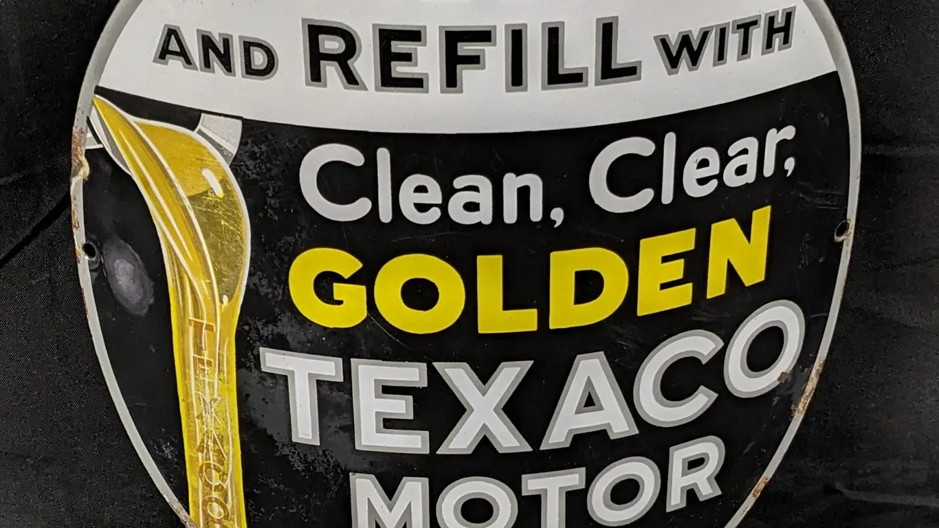 CURVED PORCELAIN SIGN DRAIN AND REFILL WITH CLEAN CLEAR GOLDEN TEXACO MOTOR OIL