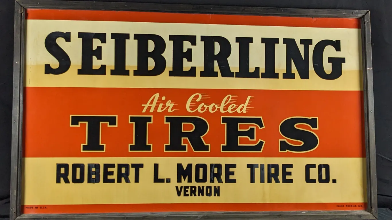 TIN SIGN SEIBERLING AIR COOLED TIRES ROBERT L. MORE TIRE CO VERNON (ORIGINAL WOOD FRAME)