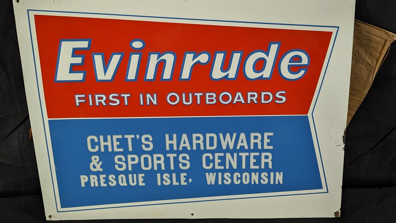 NOS EMBOSSED TIN SIGN EVINRUDE FIRST IN OUTBOARD MOTORS CHET'S HARDWARE & SPORTS CENTER PRESQUE ISLE