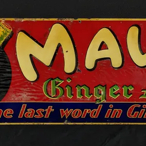 EMBOSSED TIN SIGN DRINK MAVIS GINGER ALE