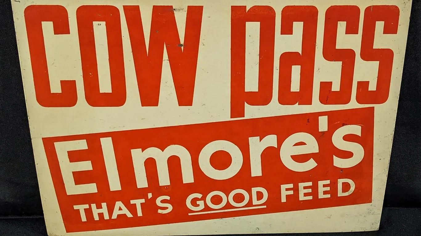 MASONITE SIGN COW PASS ELMORE'S THAT'S GOOD FEED