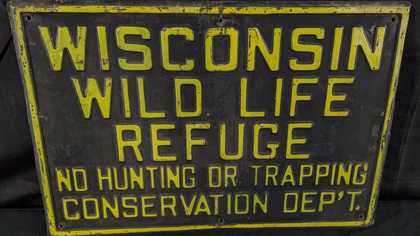 EMBOSSED TIN SIGN WISCONSIN WILDLIFE REFUGE CONSERVATION DEPT
