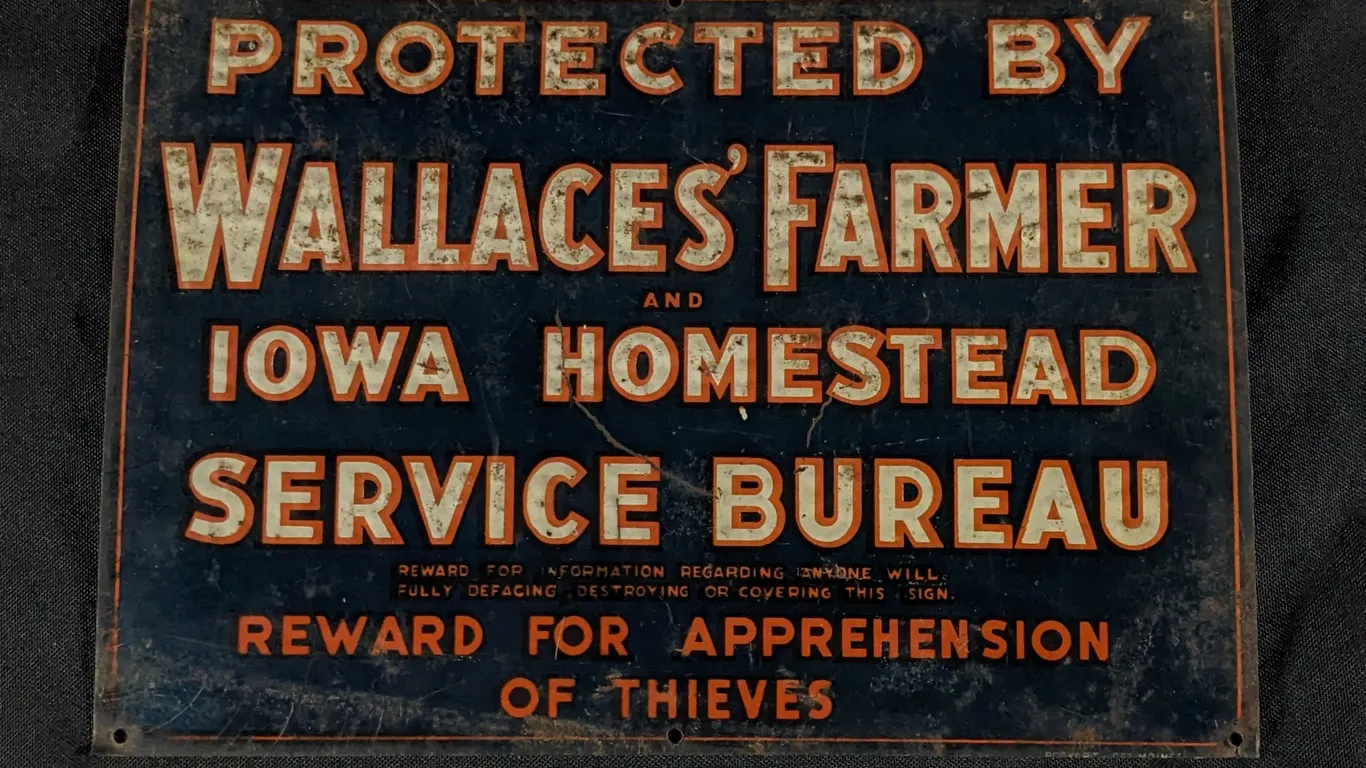 EMBOSSED TIN SIGN WALLACES' FARMER IOWA HOMESTEAD SERVICE BUREAU