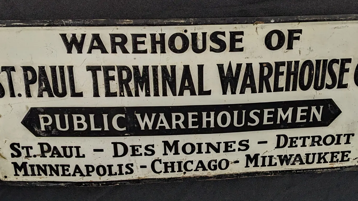 EMBOSSED TIN SIGN ST PAUL TERMINAL WAREHOUSE