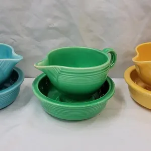 6pcs. Vintage Fiestaware Creamers & Bowls . Various Colors . No chips or cracks . Green Creamer has small chip on bottom