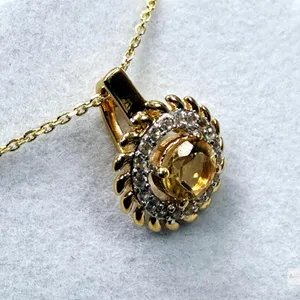 With Appraisal Gold Plated Sterling Silver Natural Citrine (0.50ct) and CZ Pendant with Gold Plated Sterling Silver Chain, W/A $335.00. Citrine is the